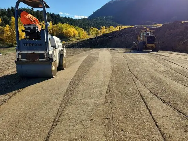Roller compacting aggregate road base in Montana